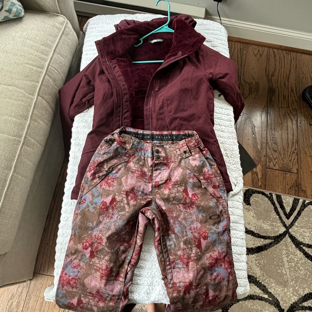 Women’s North face jacket and Oakley pants size XS worn 5x Burgundy color